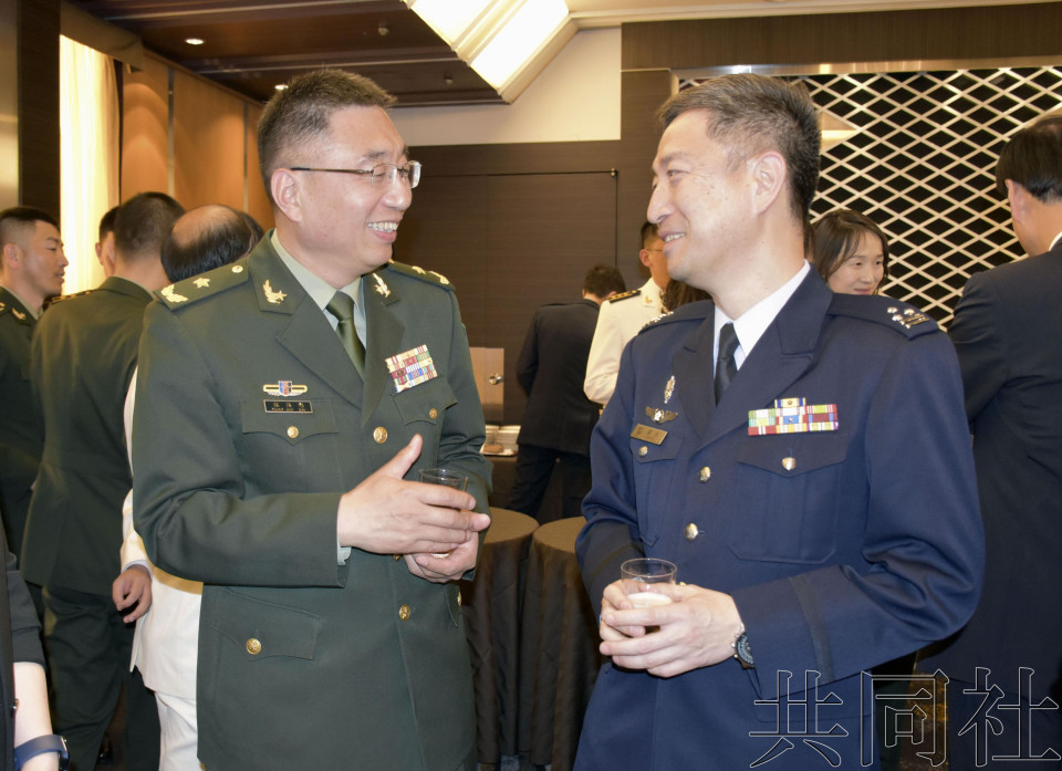 中国军方代表团访日交流 期待改善两国关系